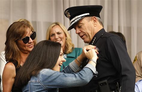 Lapd Veteran Michel Moore Sworn In As Police Chief Los Angeles Times