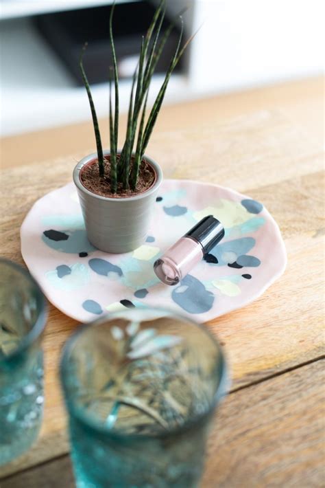 This table has multiple uses from for home parties, dorm rooms, tailgating at your favorite game, to car shows or just small spaces. DIY Polymer Clay Coffee Table Tray | Fall For DIY