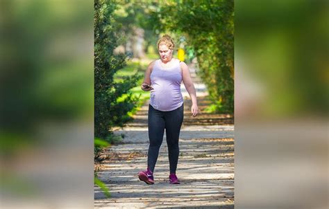 Pregnant Amy Schumer Shows Off Baby Bump During Makeup Free Stroll