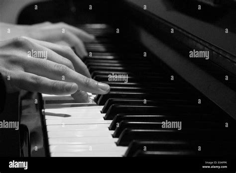 A Hands Playing The Piano Stock Photo Alamy