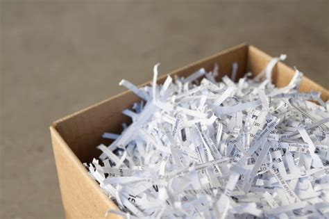 Premium Photo Close Up Of Shredded Papers In Cardboard Box