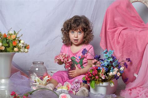 Beautiful Little Girl Playing With Flowers Stock Photo Image Of