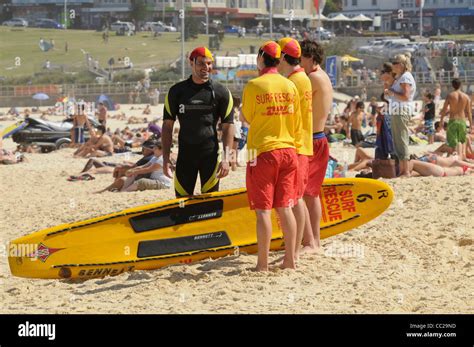 A Group Of Lifeguards Under Training With An Instructor And His