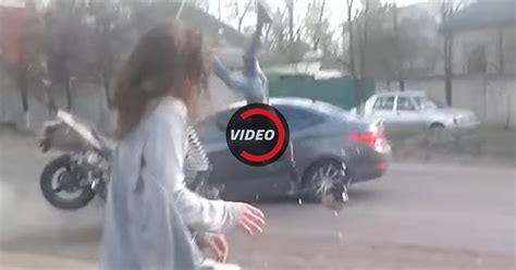 Twerking Girl Distracts Driver Who Crashes Into Motorcycle