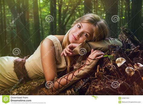 Blond Girl In A Magic Forest Royalty Free Stock Photo