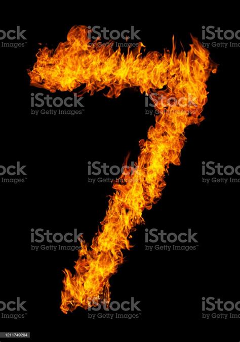 Number 7 Font In Burning Fire Isolated On Dark Background For Numeric
