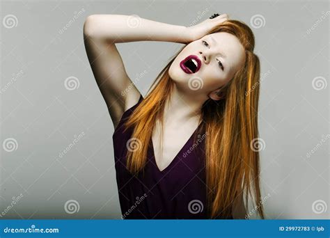 Shock Neurotic Unhappy Red Head Woman Pulling Her Hair In Frustration Scream Stock Image
