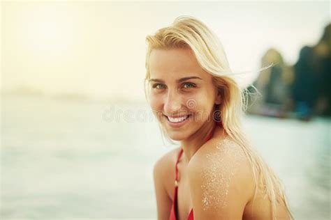 I Love Everything About The Beach Shot Of A Young Woman Spending The Day At The Beach Stock