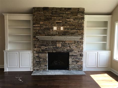 Not loving what we've found so far. Simple Stacked Stone Fireplace for Your Stacked Stone Fireplace with A Flagstone Mantle and Cu ...