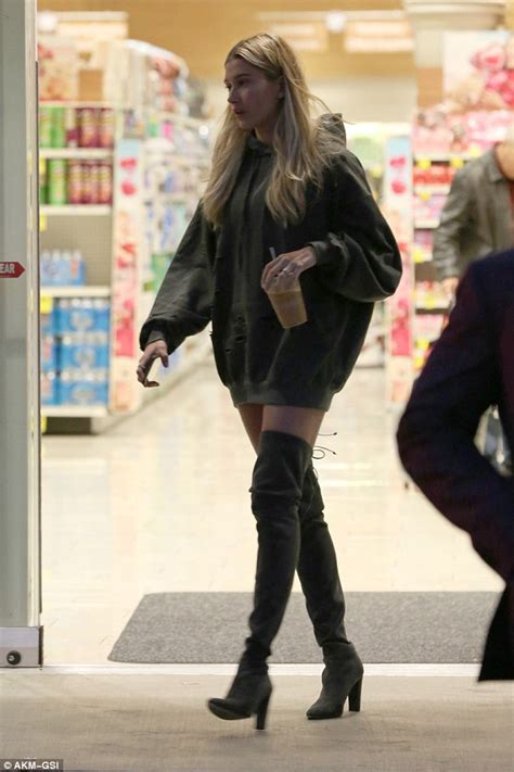 Hailey Baldwin Pairs Thigh High Boots With A Large Sweatshirt Daily