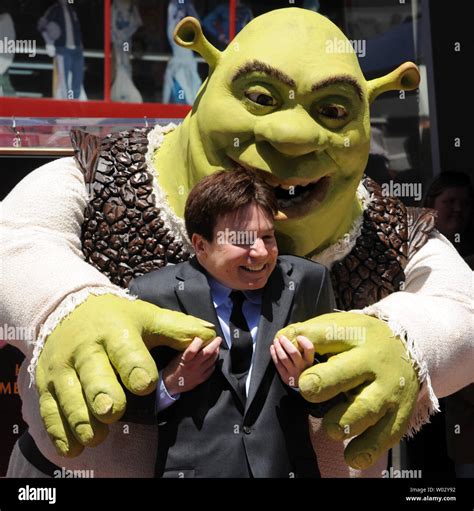 Shrek Is Joined By Actor Mike Myers As The Character Receives A Star On The Hollywood Walk Of