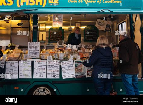 A Couple Buying Buying From Carricks Mobile Fish Van With Its