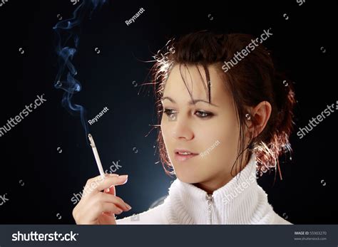 Beautiful Woman Smoking A Cigarette Stock Photo 55903270