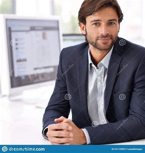 Tell Me Your Designing Ideas Portrait Of A Handsome Man Sitting At