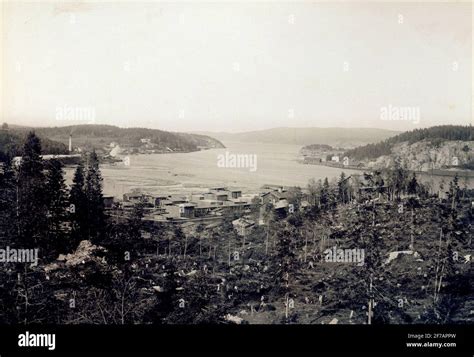 view-of-the-Ångermanland-elf-to-the-left-in-image,-you-see-strömnäs-sawmill-and-to-the-right