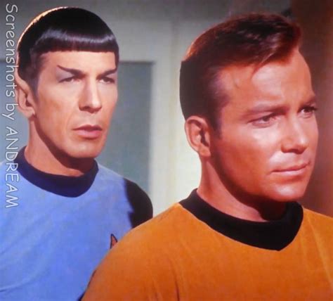 Two Men In Star Trek Uniforms Looking At The Camera