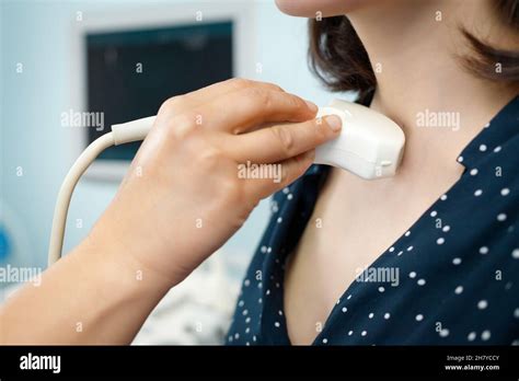 Diagnostic Examining Patient Woman Thyroid Gland Using Ultrasound