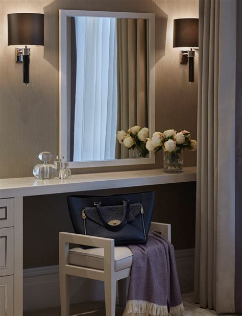 An Image Of A Room With A Vanity And Mirror On The Wall In Front Of A