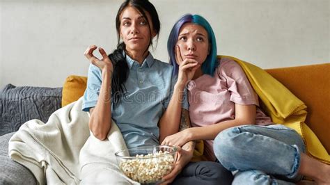 Two Young Girls Watching Boring Tv Show Stock Image Image Of Bored Relaxing 243365547