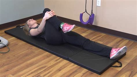 It's far more likely it's due to tight glutes or hamstrings. 6 Knee to Chest Stretch - YouTube