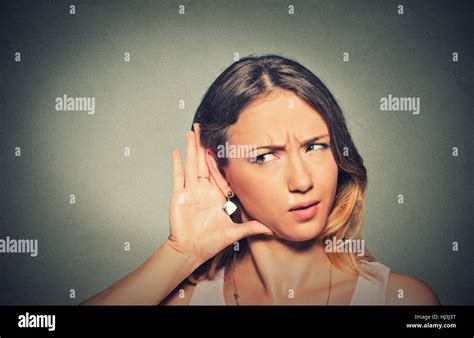 Closeup Portrait Concerned Young Nosy Woman Hand To Ear Gesture