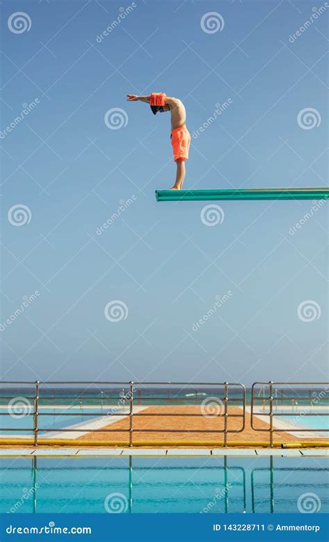 Boy Ready To Dive Into Pool Stock Image Image Of Pool People 143228711