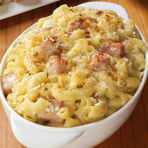 Add ham, peas, cheddar cheese, and parmesan cheese and stir and cook over medium heat until cheese is melted. Ham And Cheese Pasta Bake Recipe