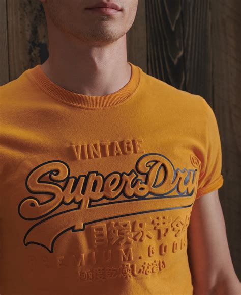 Mens Vintage Logo Embossed T Shirt In Alaska Gold Superdry