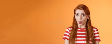 Impressed And Surprised Emotive Good Looking Female With Chestnut Hair