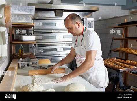 Baker Working In Bakery Stock Photo Alamy