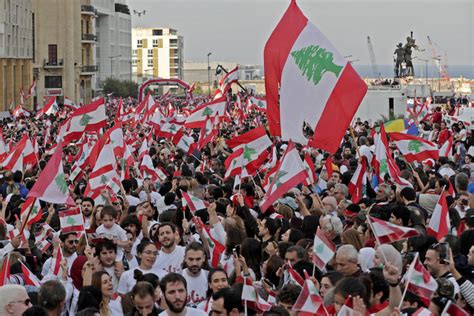 Lebanons Protesters Top Politicians Hold Parallel National Day