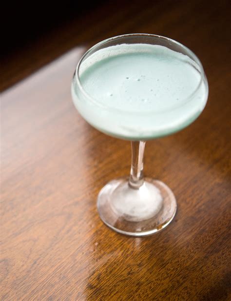 To make this creamy cocktail, mix up brandy, blue curacao liqueur, vanilla liqueur, half & half, and lemon juice, and bang, you have a super tasty citrus drink ready to go! PUNCH | Blue Angel Cocktail Recipe