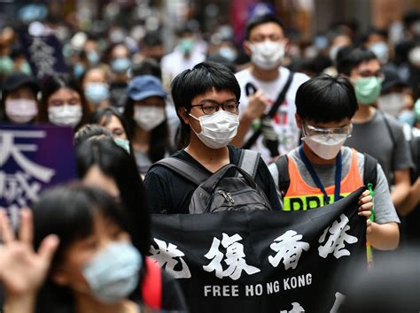 Hong Kong Police Fire Tear Gas As Thousands Protest Planned Security