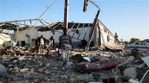 Violence Flares Up In Libya Airstrike Kills 40 At Tripoli Migrant