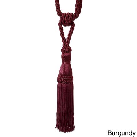 A Brown Tasselle With A Long Rope On The End And A Knot Around It