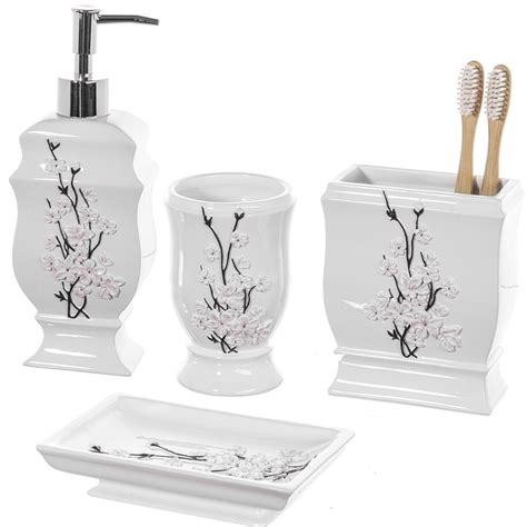 The set includes a soap/lotion dispenser, soap dish, tumbler and toothbrush holder. Creative Scents 4 Piece Bathroom Accessories Set ...