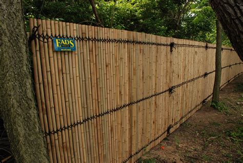 A bamboo fencing that is made up of poles will require much more work you may not want to do yourself unless the bamboo fence is small and serves as a decorative piece. Ohio Fence Company | Eads Fence Co.. Bamboo Privacy Photo Gallery