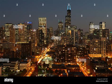 Chicago Skyline View At Dusk As Seen From A Luxury Condo In The Old