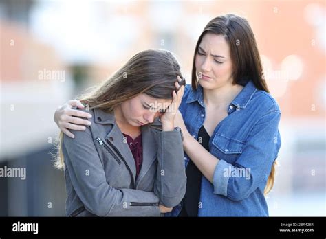 Teenage Girl Comforting Friend Hi Res Stock Photography And Images Alamy