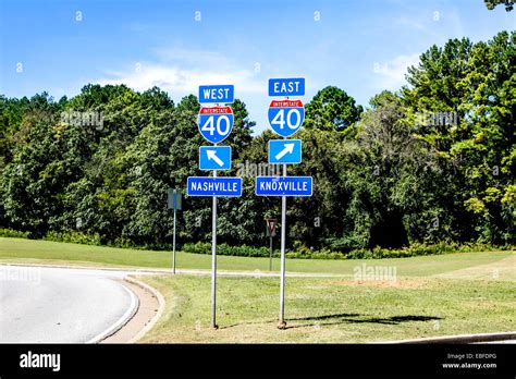 Two Signs At Interstate 40 In Tennessee West To Nashville And East To