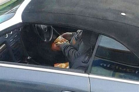 Driver Caught On Camera Making Crisp Sandwich While Waiting For