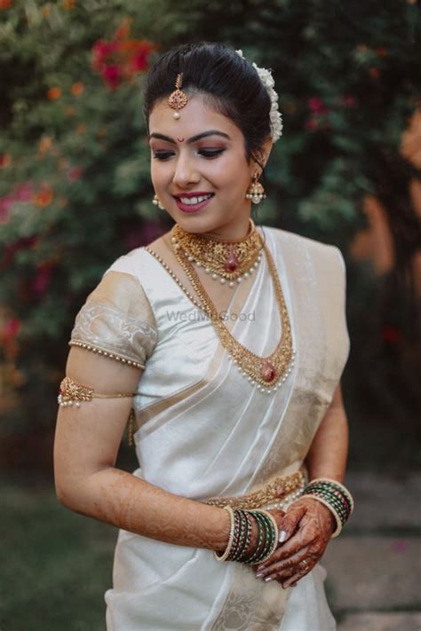 Photo Of Malayali Bride In Gold Jewellery And White Saree Bridal