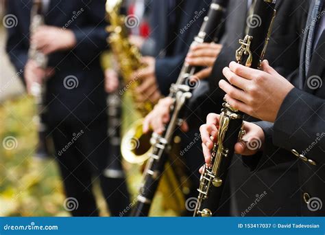 Group Of Musicians In Suits Playing The Clarinet Stock Image Image Of Blow Musical 153417037