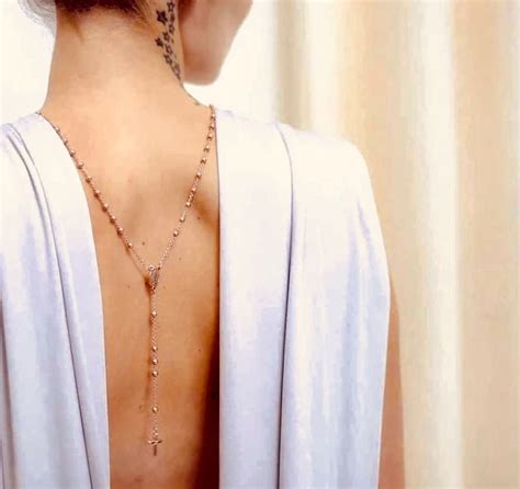 Flaunt Some Skin By Wearing The Rosary Necklace Backwards Rosary Necklace Outfit Back