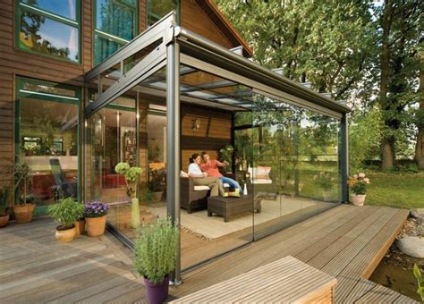 Open rafters mean that you can weave plants through the beams, and are solid enough to hang an outdoor light. 20 Beautiful Glass Enclosed Patio Ideas