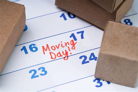 Moving Day Calendar For Note With Cardboard Boxes And Truck Stock