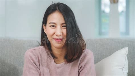 Teenager Asian Woman Feeling Happy Smiling And Looking To Camera While