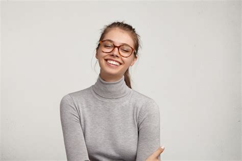 Free Photo Portrait Of Young Woman Wearing Eyeglasses