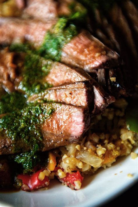 Serve in hamburger buns with barbecue sauce and coleslaw. Grilled Flank Steak with fresh Chimichurri over Saffron Cauliflower Rice - girl carnivore ...