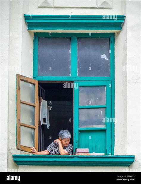 Nosey Woman Window High Resolution Stock Photography And Images Alamy